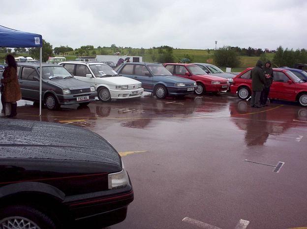 Six MG 'M' and two MG Zed cars meet in the rain at Gaydon