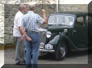 Neil Cairns explains hand signals to Jack Murray