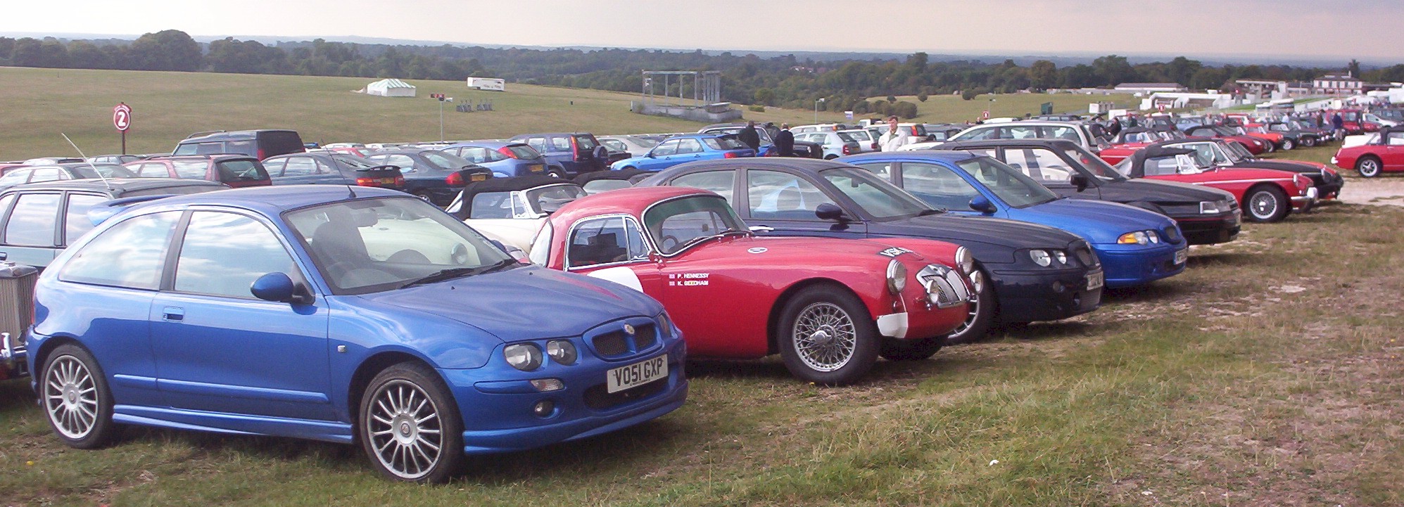 MGs lineup in age in carpark.
