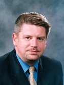 Kevin Howe, Group Chief Executive
